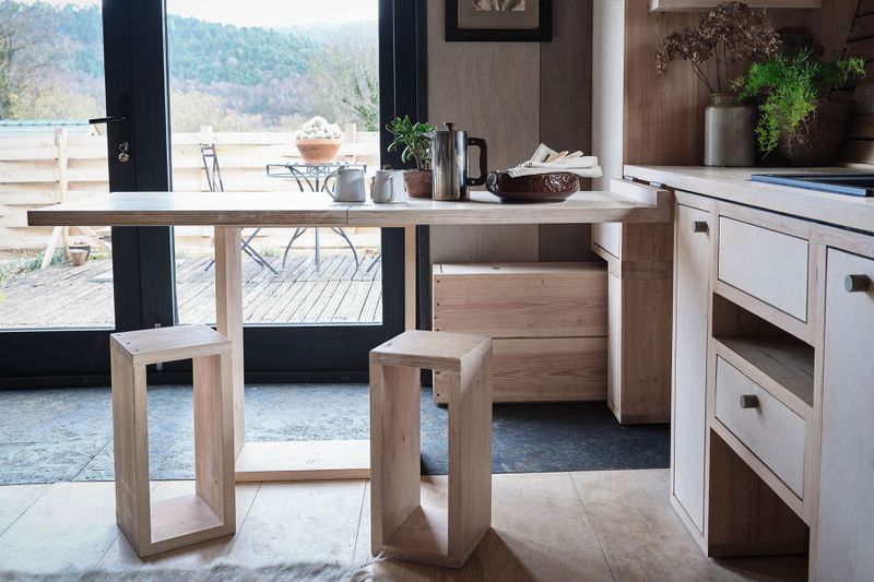A breakfast bar that can be easily stored into the kitchen cabinet.
