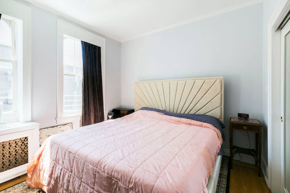 Master bedroom with pink duvet