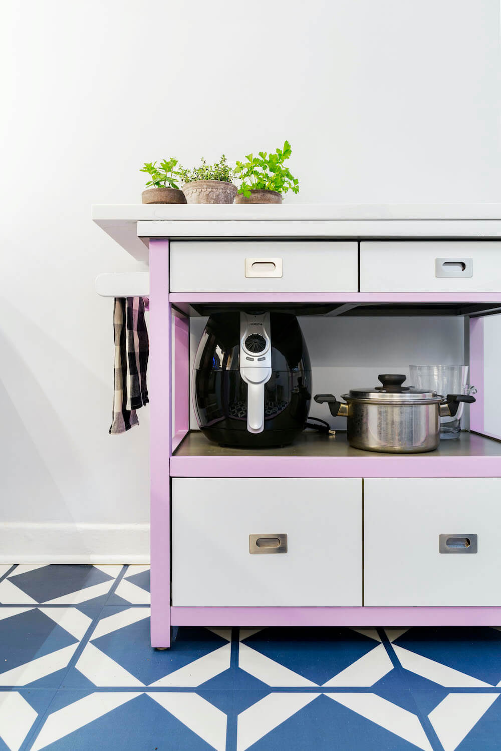 Image of a small kitchen island painted purple