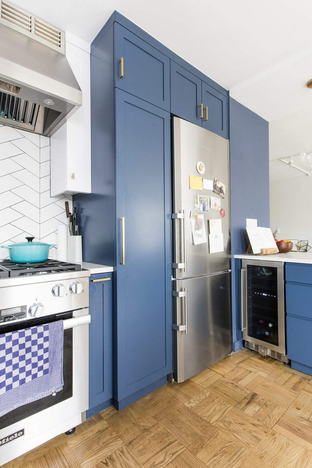Image of a kitchen with a small wine fridge in corner