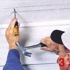Person using a hammer and chisel on the ceiling. 